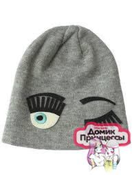 Фото Шапка стильная с глазами и ресницами серая - магазин  "Домик Принцессы"
